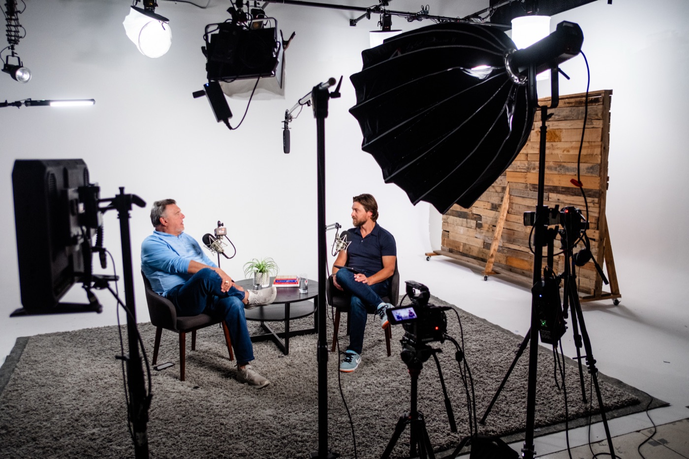 Ryan Koral recording a podcast interview in the studio